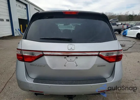 2012 Honda Odyssey Touring z USA, uszkodzony, nr VIN 5FNRL5H9XCB043913